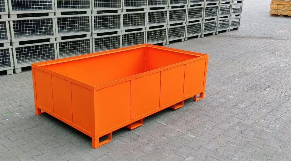 Orange sheet-metal steel container with solid walls